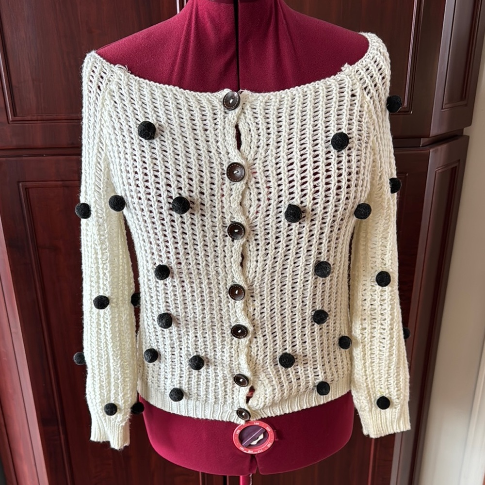 Cream and Black Chunky Knit Cardigan with Pom-Pom Accents